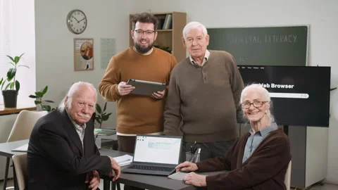 Group of Senior People Posing in Computer Literacy Class Stock Footage 333708660