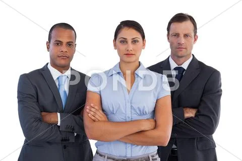 Group of serious business people standing together Stock Photos