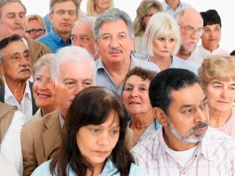 A group of serious looking people Stock Photos