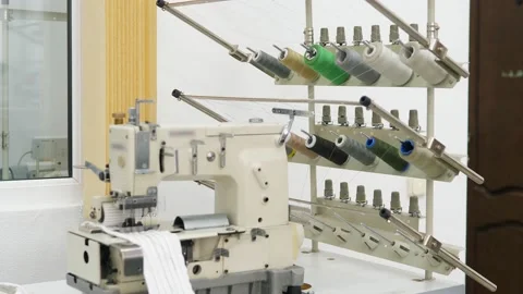 Group of sewing threads in skeins. A bunch of large multicolored spools of Stock Footage 214919002