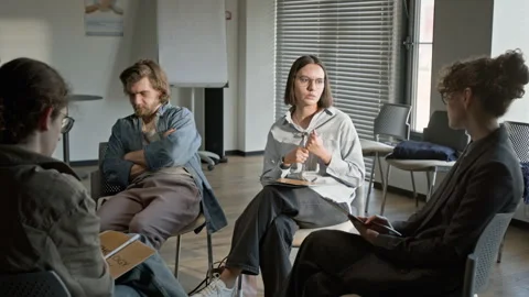 Group Sharing Problems in Mental Health Therapy Session Stock Footage 337238541
