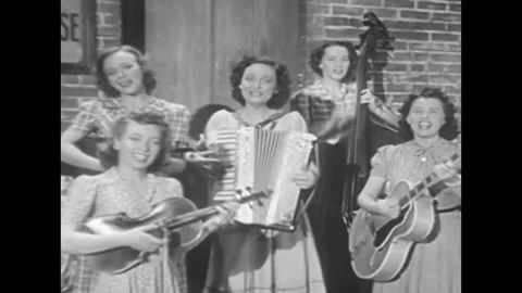 A group of singers ask who threw the overalls in Mrs. Murphy's chowder in this Stock Footage 152663228