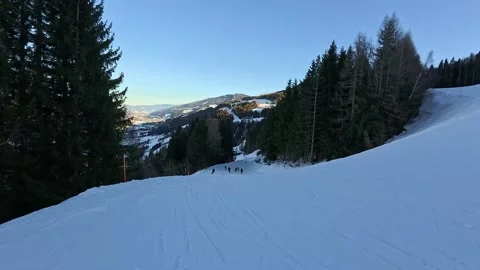 Group of Skiers on a Coordinated Dynamic Downhill Run on the Slope in Schladming Stock Footage 320782117