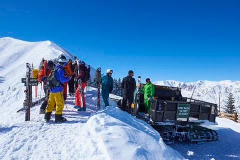 Group of skiers preparing on snow covered mountain, Aspen, Colorado, USA Stock Photos