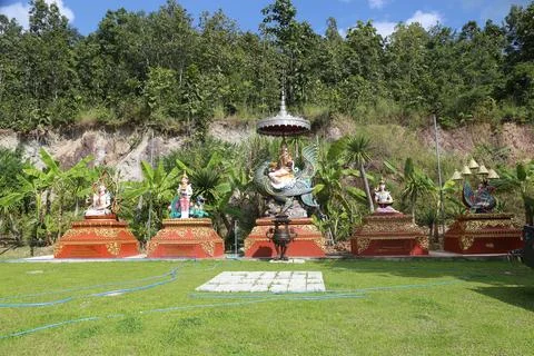 A group of small and large ethnic architectural statues with traditional th.. Stock Photos