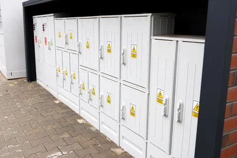 Group of small electrical meter boxes Stock Photos