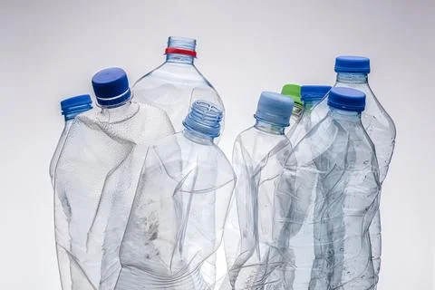 Group of smashed plastic water bottles. Recycle concept studio photo. Stock Photos