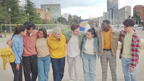 Group of smiling multiethnic young friends having fun in the city Stock Footage 183316630