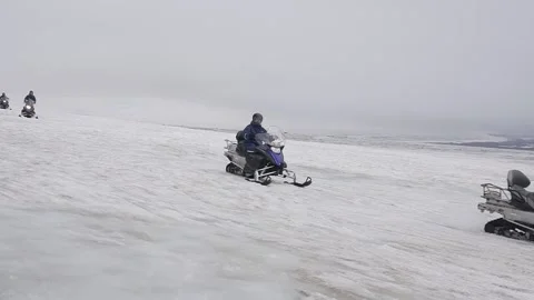 Group of Snowbiles in Iceland Stock Footage 236725919