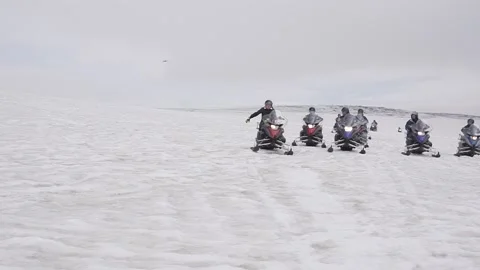 Group of Snowbiles in Iceland Stock Footage 236725943