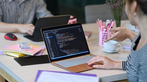 Group of software development are brainstorming ideas for website interface Stock Photos