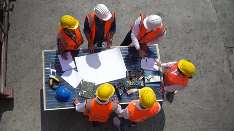 Group of Solar power plant Engineers Team Meeting and handshake together with Stock Footage 156384922