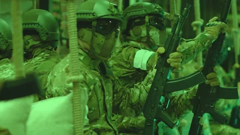 Group of Soldiers or Special Forces Loading Weapons and Preparing Before Fight Stock Footage 171175279