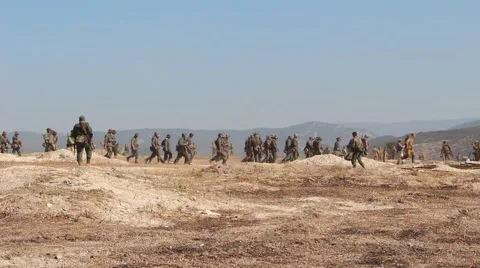 A group of soldiers walking in the field Vídeo Stock 56286847
