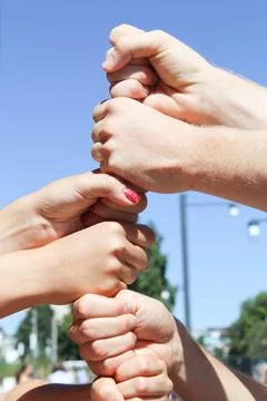 Group stacks fists Stock Photos