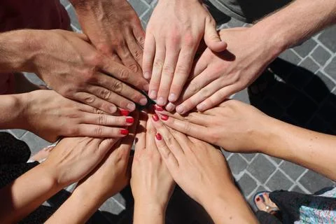Group stacks hands Stock Photos