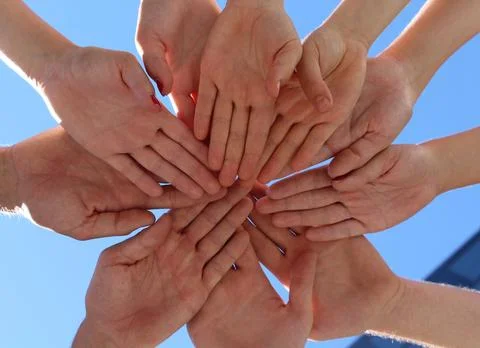 Group stacks hands Stock Photos
