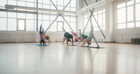 Group stands in leg high pose at profess... | Stock Video | Pond5