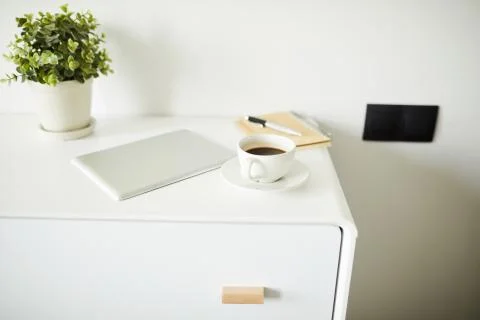 Group of stationary objects on white nightstand Foto stock