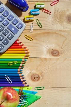 A group of stationery on the left side of the background Stock Photos
