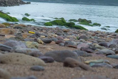 A group of stone in the sea Stock Photos