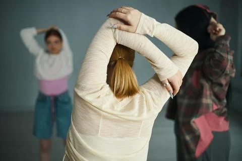 Group Stretching During Yoga Class with Diverse Participants Stock Photos