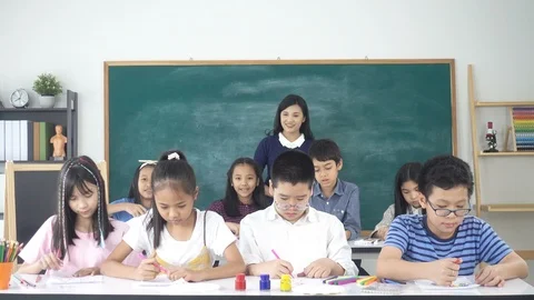 Group of student throw paper in the are at class room Stockbeeldmateriaal 105837903