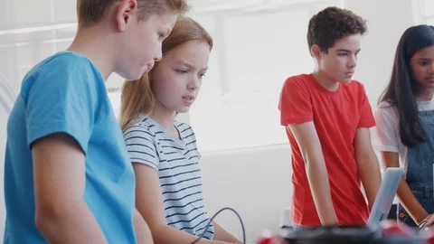 Group Of Students In After School Computer Coding Class Learning To Program Stock Footage 111932974