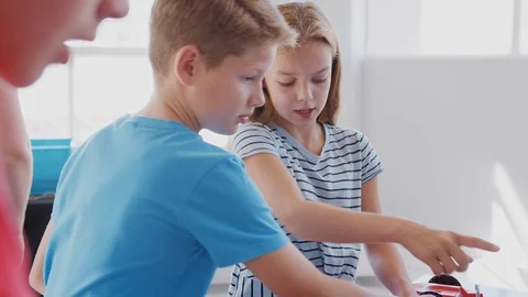 Group Of Students In After School Computer Coding Class Learning To Program Stock Footage 111933160