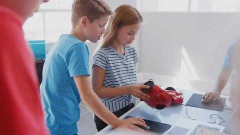 Group Of Students In After School Computer Coding Class Learning To Program Stock Footage 111933168