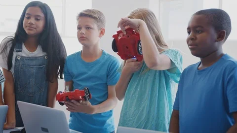 Group Of Students In After School Computer Coding Class Learning To Program Stock Footage 111983890