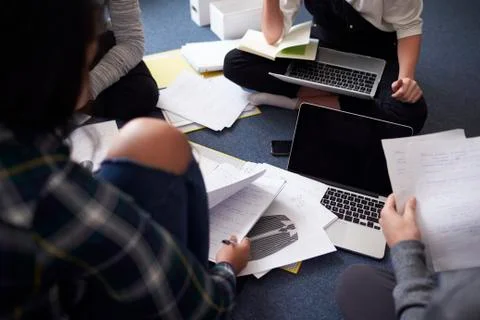 Group Of Students Collaborating On Project Together Stock Photos