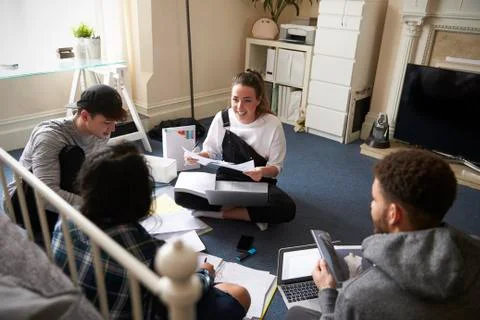 Group Of Students Collaborating On Project Together Stock Photos