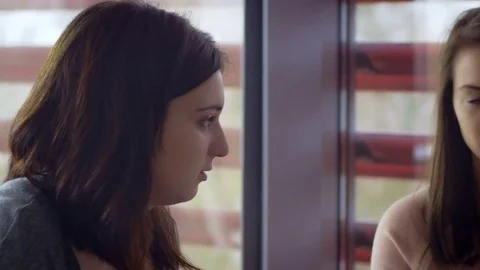 Group of students considering different ideas for a project at the university Video stock 75554497