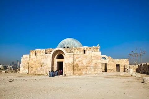 A group of students enter the old Mosque (Citadel) on a bright sunny day. Stock Photos