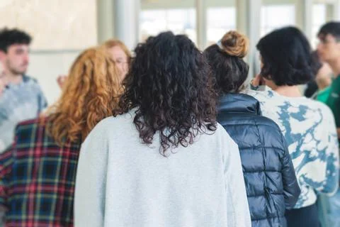 Group of students on excursion visit gallery museum with tour guide, a doce.. Stock Photos