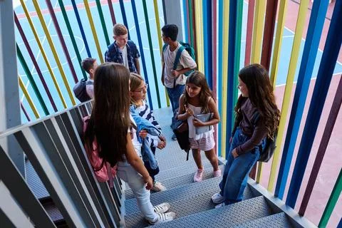 Group of students going to school on stairs Stock Photos
