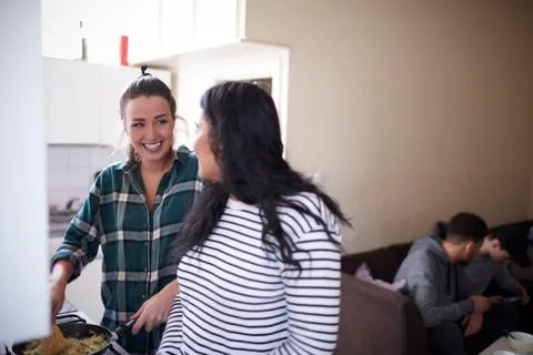 Group Of Students Hanging Out In Shared House Together Stock Photos