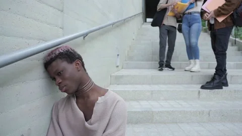 A group of students harass a young student at the university. Stock Footage 233081168