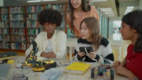 Group of students learning to building electronic car model construction project Stock Footage 320040744