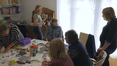 Group of students learning from teacher about arts and crafts Stock Footage 76899478