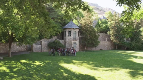 Group of Students listen to Knight Teaching at Castle Stock Footage 62652997
