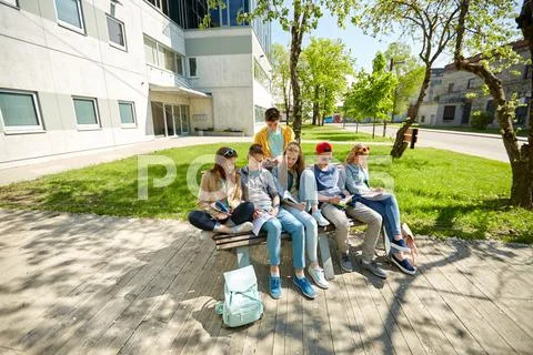 Group of students with notebooks at school yard Stock Photos