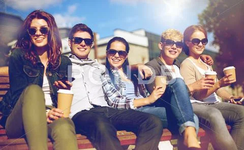 Group Of Students Or Teenagers Drinking Coffee