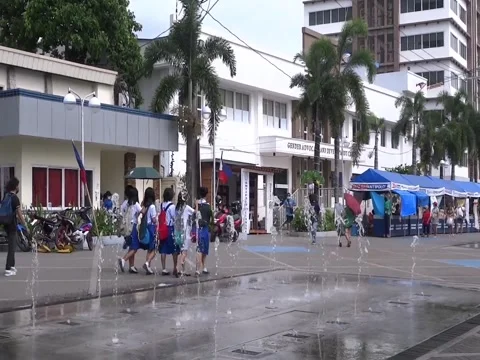 A Group of Students Passing by Infront of Public Park of Antipolo City Stock Footage 242673135