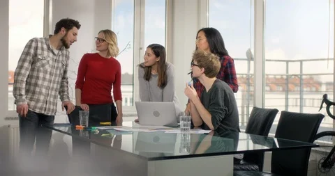 Group of students with positive mindset preparing presentation on a modern co Video stock 91932327