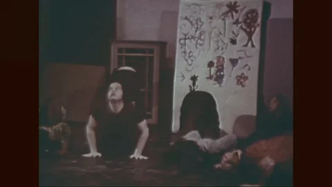 Group of students practice yoga lesson with instructor - 1971 Stock Footage 105687524