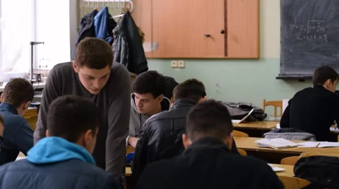 The group of students prepare for the exam during the break in the classroom. Stock Footage 63158770