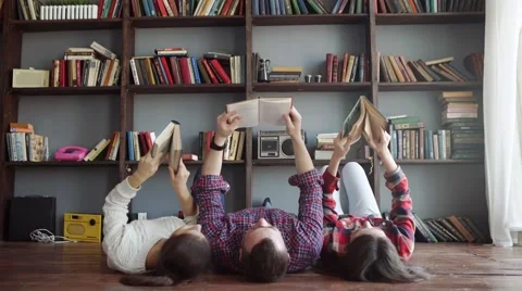 Group of students reading book at school Stock Footage 59337594