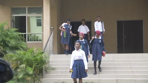 Group of students in school campus discussing and  walking together Stock Footage 252348945